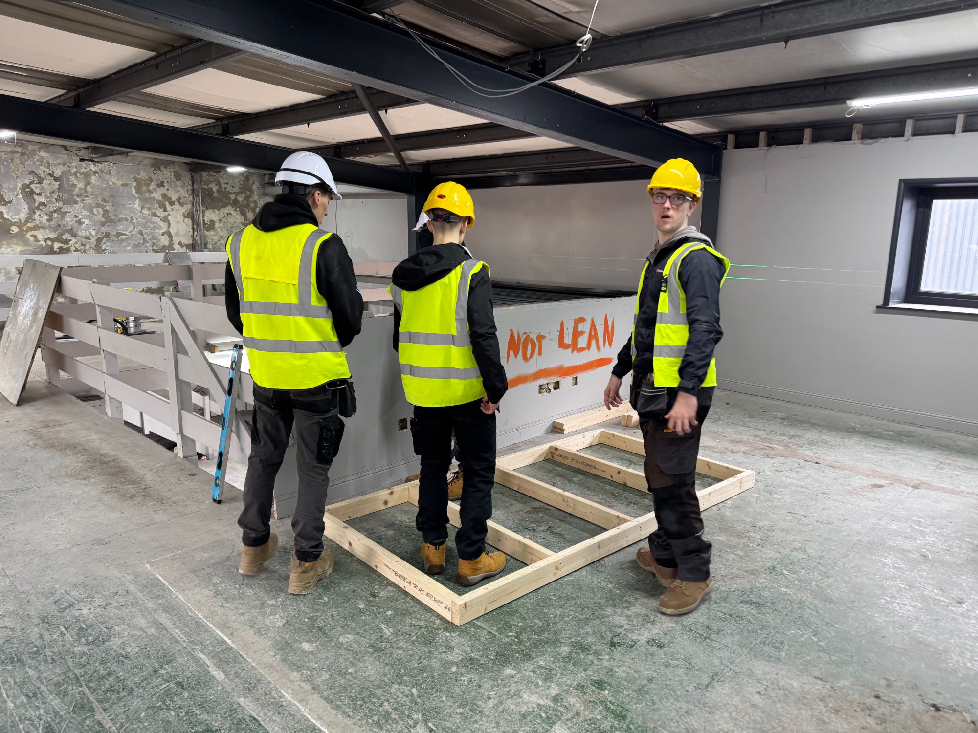Burnley College students in hard hats
