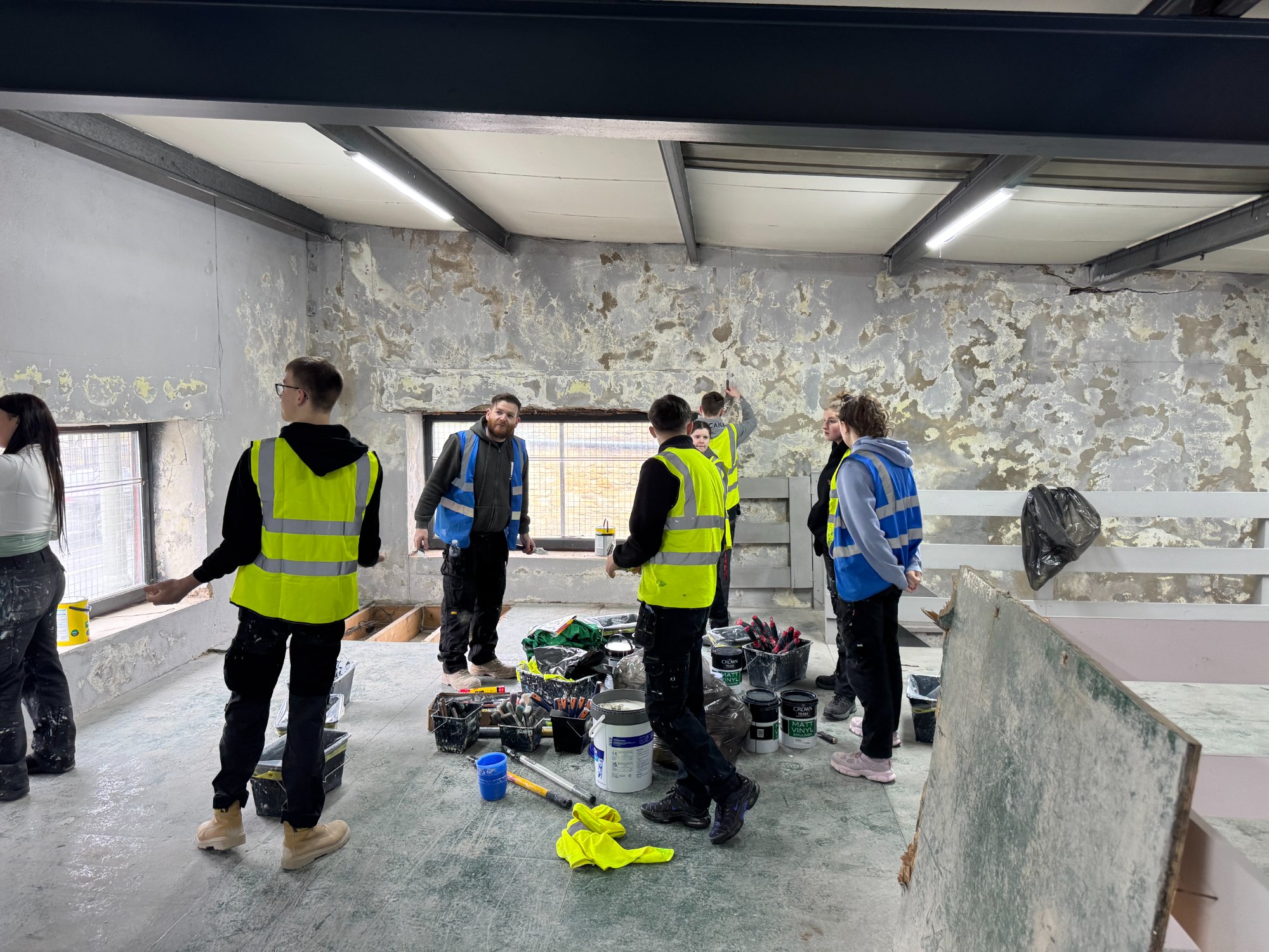 Students with paint tins