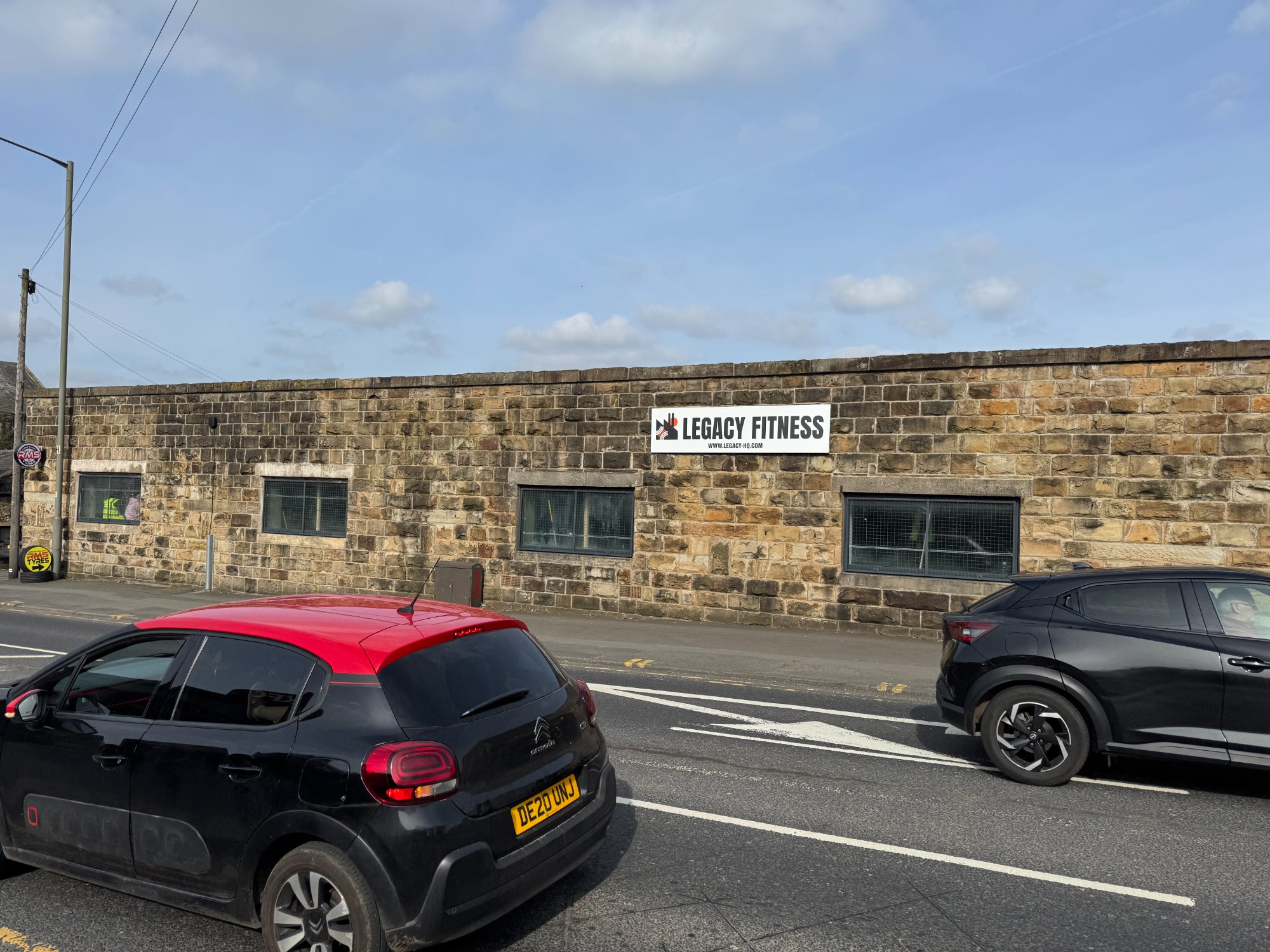 Legacy Fitness sign from across the road