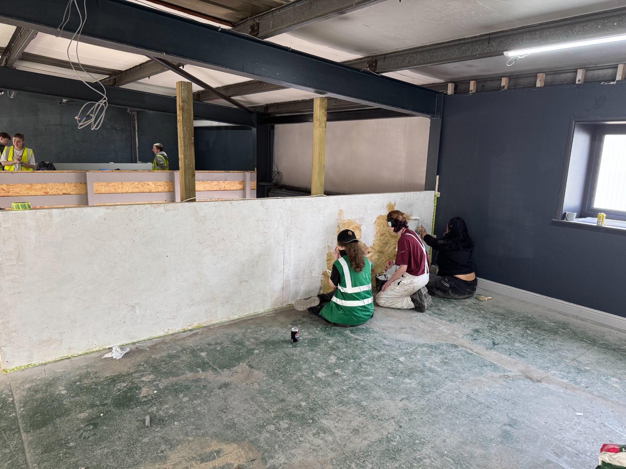 Burnley College students working across the space